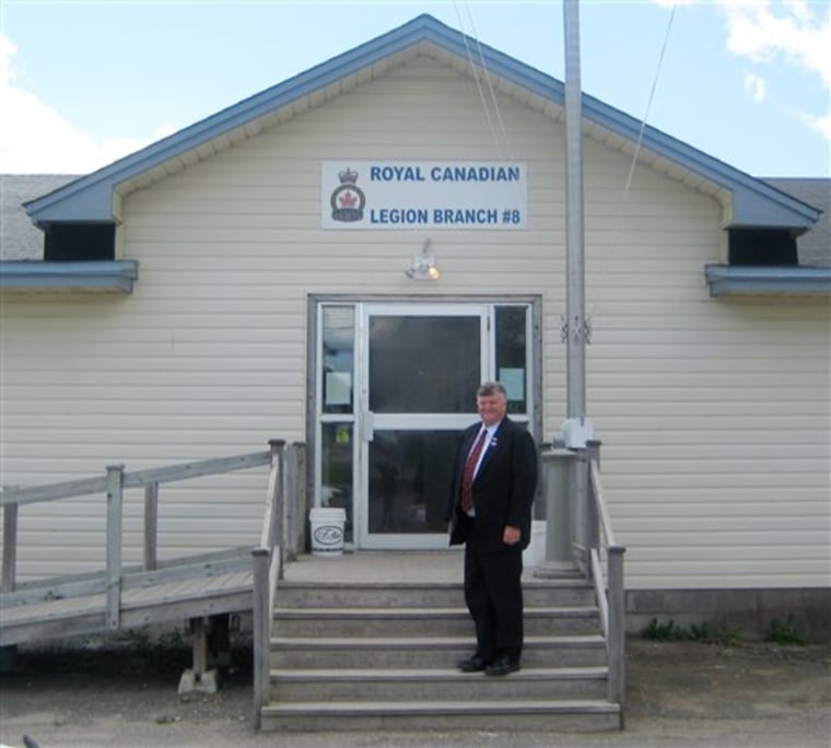 Gander, Newfoundland, Canada Mayor Claude Elliott stands in front of the Royal Canadian Legion Hall which was used as a shelter for the passengers of a flight stranded after the terrorist attacks on Sept. 11, 2001.